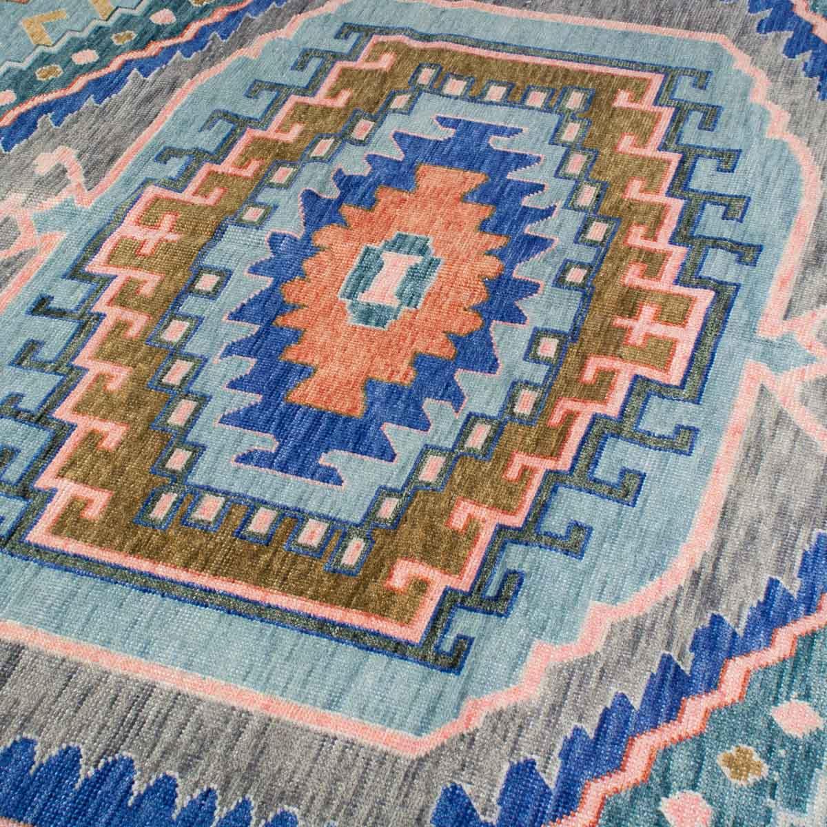 Geometric Medallion Layered Tribal Motif Hand-Knotted Wool Area Rug