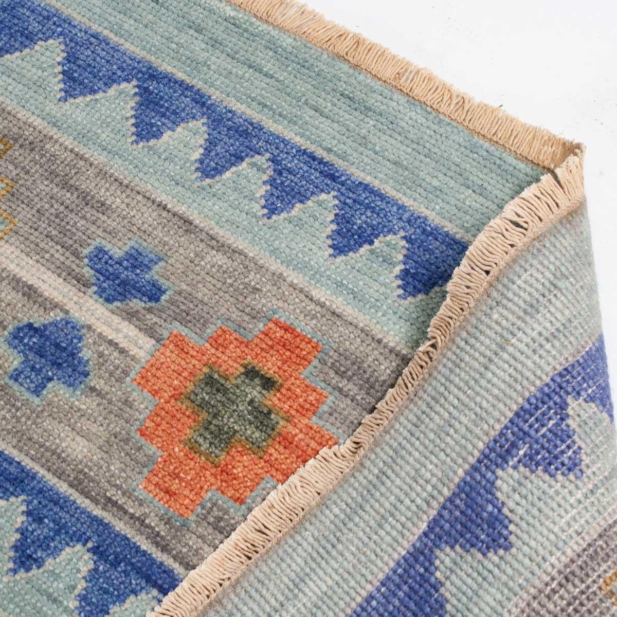 Geometric Medallion Layered Tribal Motif Hand-Knotted Wool Area Rug